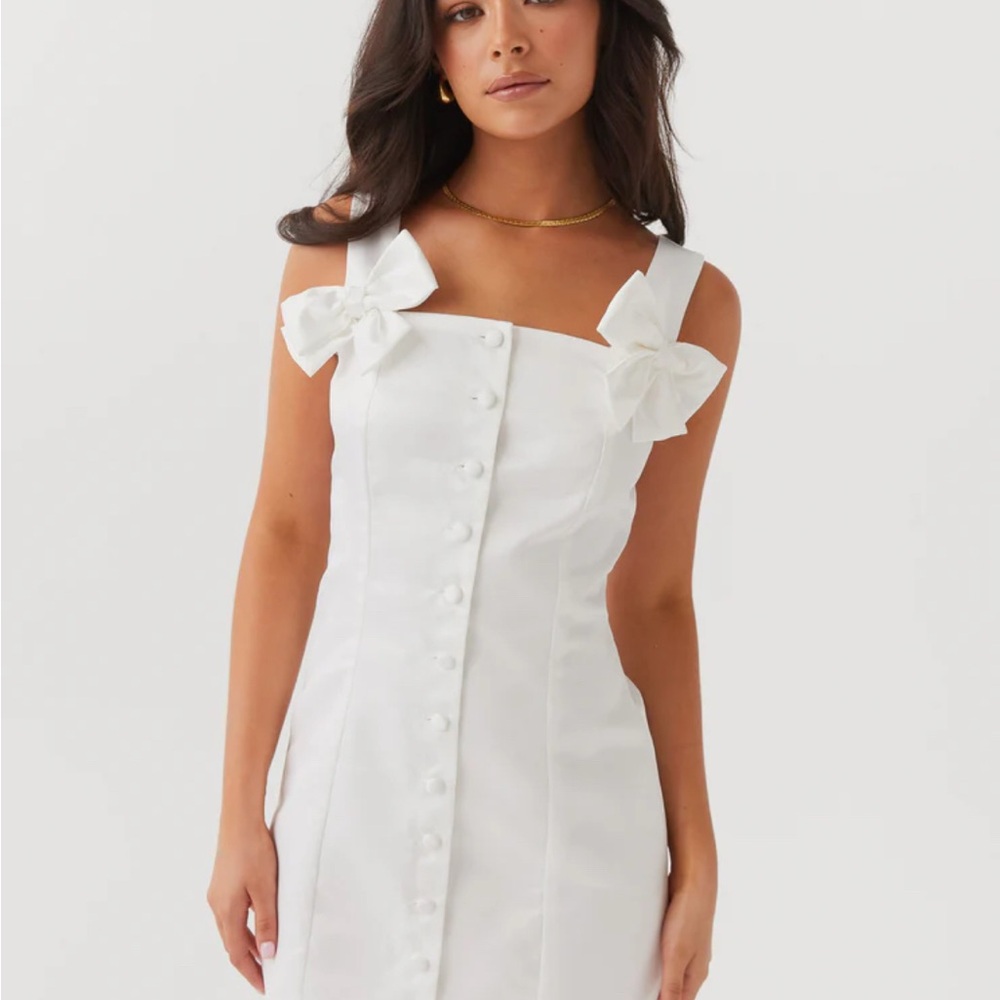 Elegant White Dress with Bow Accents